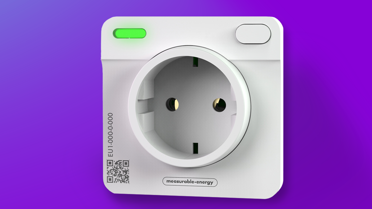A Type F measurable.energy plug socket showing a green LED light.