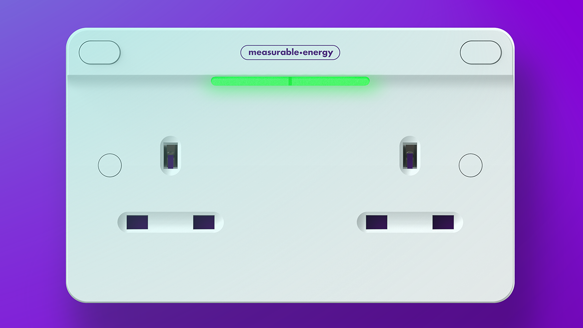 A 2 gang measurable.energy plug socket showing a green LED light.