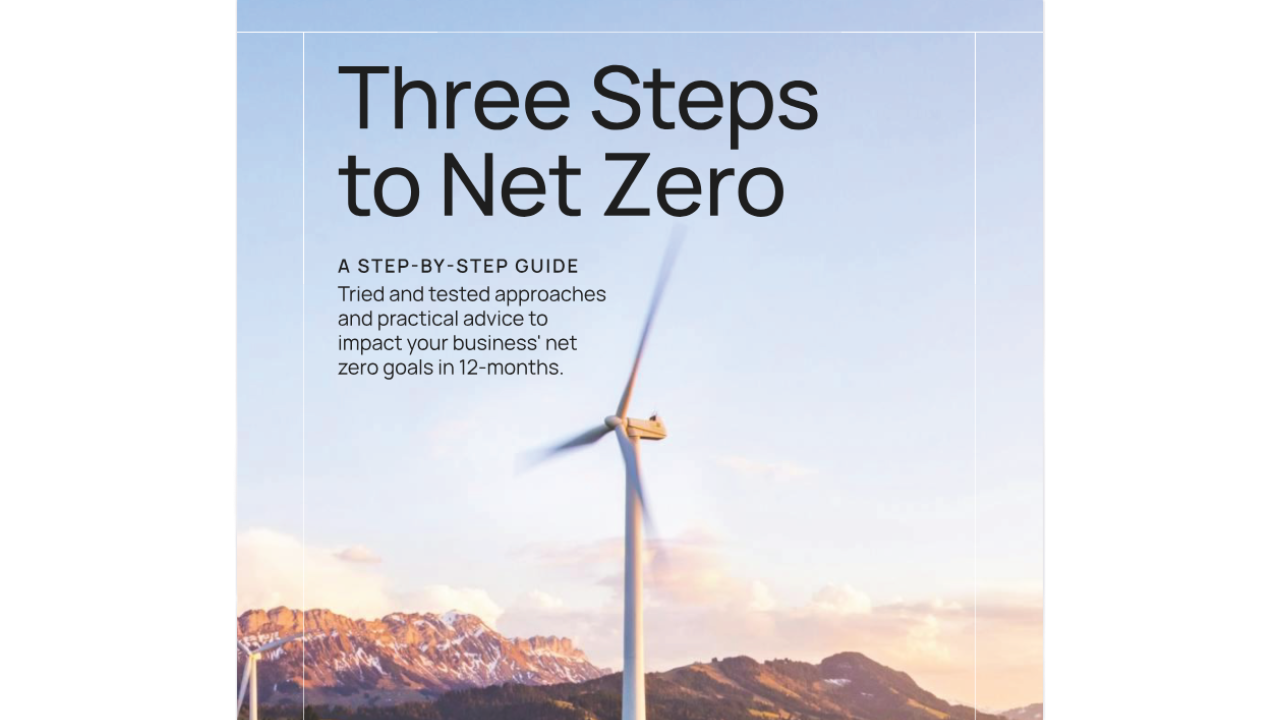 Three Steps to Net Zero Guide with a wind turbine on top of a hill background
